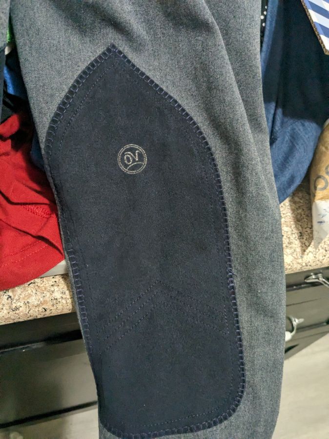 Ovation grey/blue side zip breeches, size 34L, no stains/tears!
